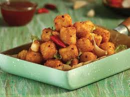 CHILLI GARLIC POTATO POPPERS  500GMS
