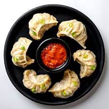 CHICKEN CHEESE MOMOS 500GMS (20 PCS)