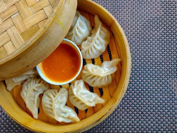 CHICKEN CHEESE MOMOS 500GMS (20 PCS)