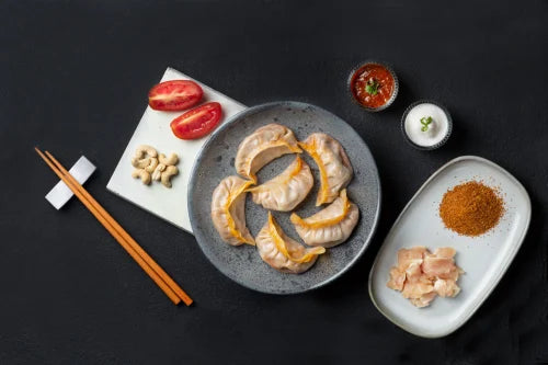 VEG SCHEZWAN MOMOS 500GMS (20 PCS)